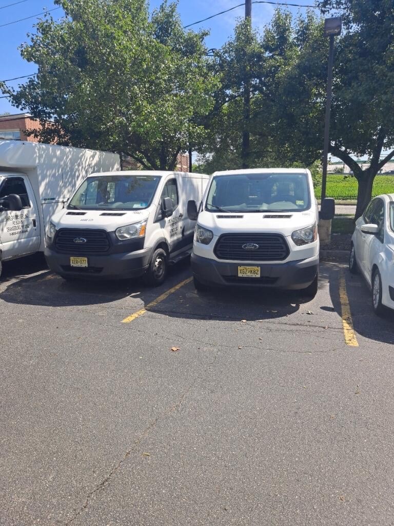 Pair of company Ford Transit vans